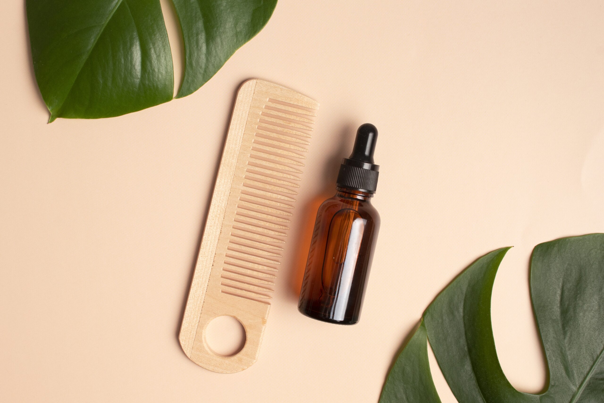 essential oil for hair care with wooden hair comb 2026 01 08 05 41 30 utc scaled